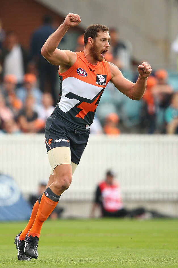 AFL 2016 Rd 04 - GWS Giants v Port Adelaide CANBERRA, AUSTRALIA - APRIL 17: Shane Mumford of the Giants celebrates kicking a goal during the round four AFL match between the Greater Western Sydney Giants and the Port Adelaide Power at Star Track Oval on April 17, 2016 in Canberra, Australia. (Photo by Cameron Spencer/AFL Media/Getty Images)